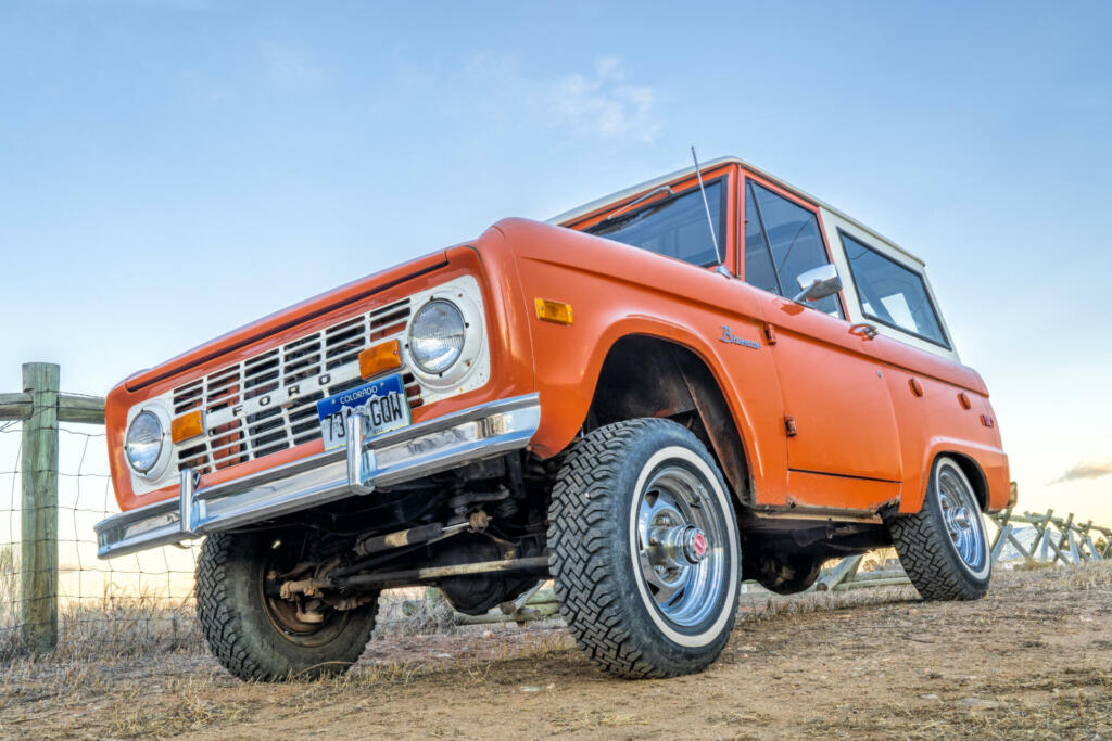 Fort Collins, CO, USA - January 7, 2019: Vintage, first generation, Ford Bronco ranger wagon parked on a rural road. This legendary model was manufactured in 1972-1976.