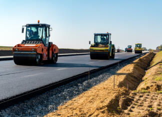 Road rollers building the new asphalt road