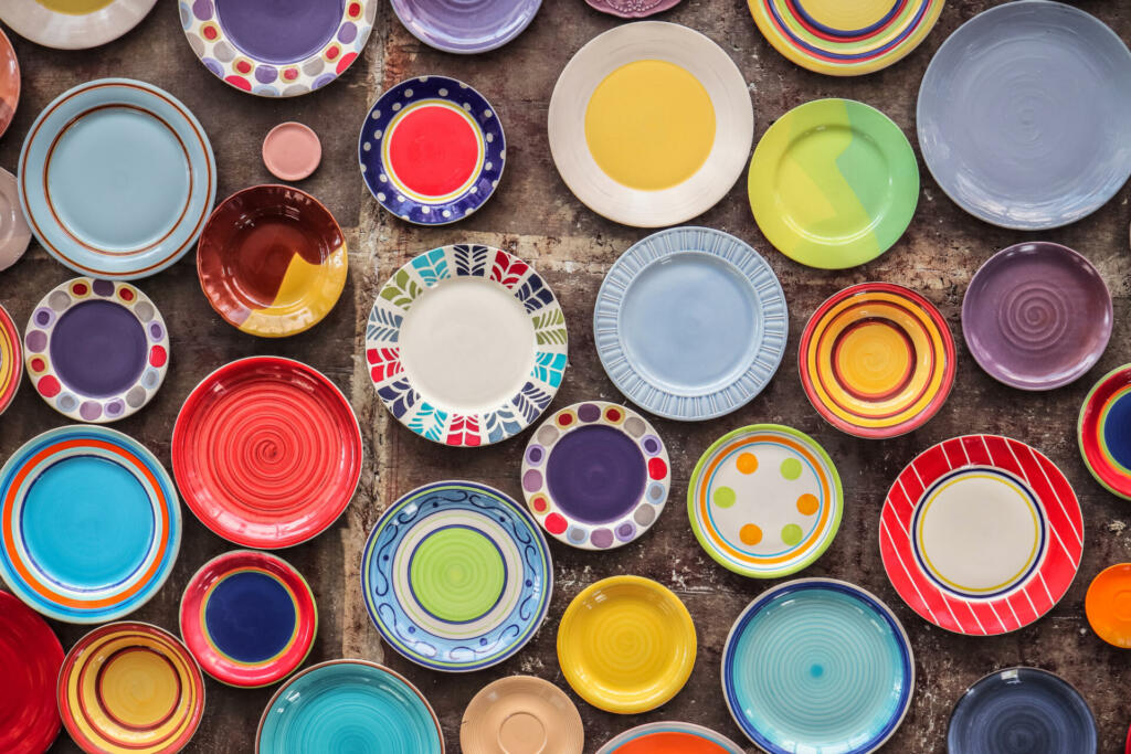 Colorful ceramic porcelain dishes kitchenware pattern background