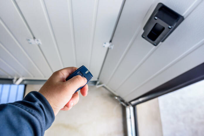 Hand use remote controller for closing and opening garage door