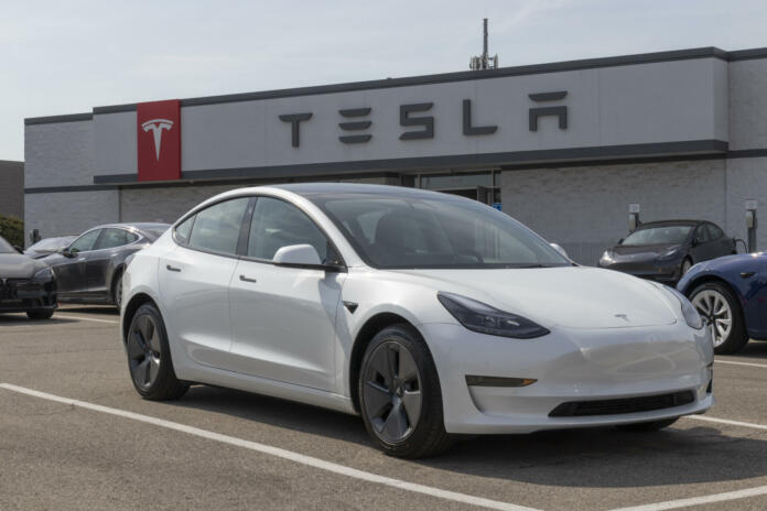 Indianapolis - Circa March 2022: Tesla EV electric vehicles on display. Tesla products include electric cars, battery energy storage and solar panels.