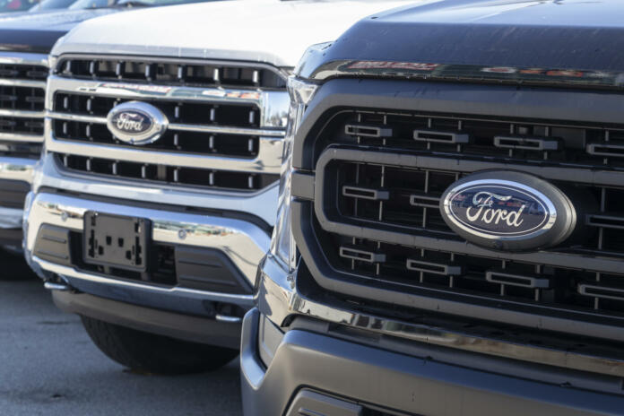 Indianapolis - Circa December 2021: Ford F-Series Trucks Display. The Ford F-150, Super Duty F-250, F-350 and F-450 are the best selling trucks in the US.