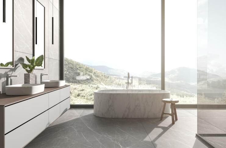 Modern bathroom interior design with nature view background. Sinks, bathtub and shower. Stone tile on wall and floor. 3d rendering illustration.