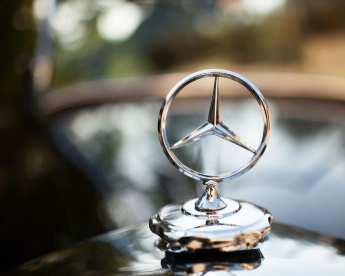 SalsoMaggiore, Parma, Italy - May 11, 2011: Detail of the emblem logo on a Mercedes - Benz Black Torpedo 1935 in the Emilia-Romagna region.very shallow DOF, wide aperture.