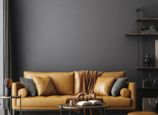 Iz katerega materiala sedežno garnituro izbrati? Black living room interior with leather sofa, minimalist industrial style, 3d render