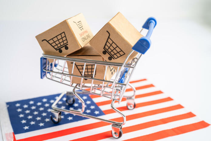 Box with shopping cart logo and USA America flag, Import Export Shopping online or eCommerce finance delivery service store product shipping, trade, supplier concept.