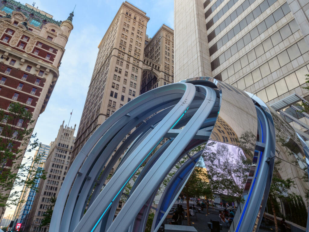 Dallas, Texas \ USA -May 7, 2022: The Globe structure overlooking office buildings in the downtown area.