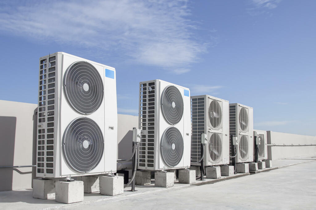 Air conditioning (HVAC) installed on the roof of industrial buildings.