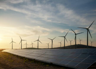 Usluga ali škoda naravi? Pohorju se obeta kar 56 vetrnih elektrarn Solar panels and wind turbines generating renewable energy for green and sustainable future.