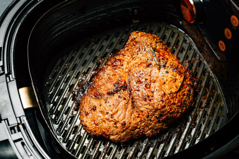 Grilled flank beef steak with rosemary, prepared in air fryer
