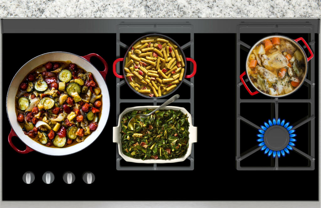 Cooking vegetables and meat on a gas stove top view
