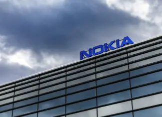Helsinki: Dark clouds over Nokia brand name on top of a building in Helsinki, Finland on September 16, 2017