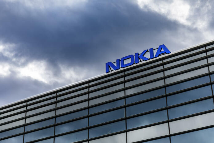 Helsinki: Dark clouds over Nokia brand name on top of a building in Helsinki, Finland on September 16, 2017