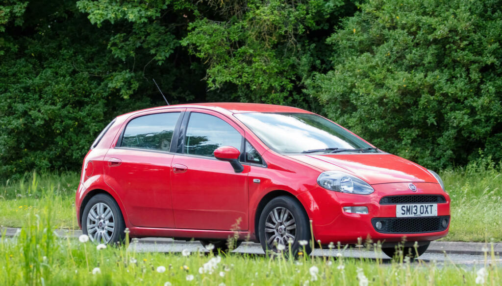 Milton Keynes,Bucks,UK - May 19th 2022. 2013 1242 cc Fiat Punto car travelling on an English country road