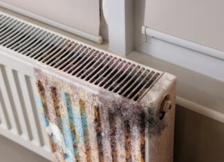 Kdaj je treba zamenjati radiatorje? sodoben radiator, ki ga je načela rja