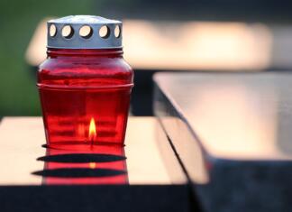 Pridružite se akciji: Za 1. november prižgite svečo manj rdeča nagrobna sveča na pokopališču