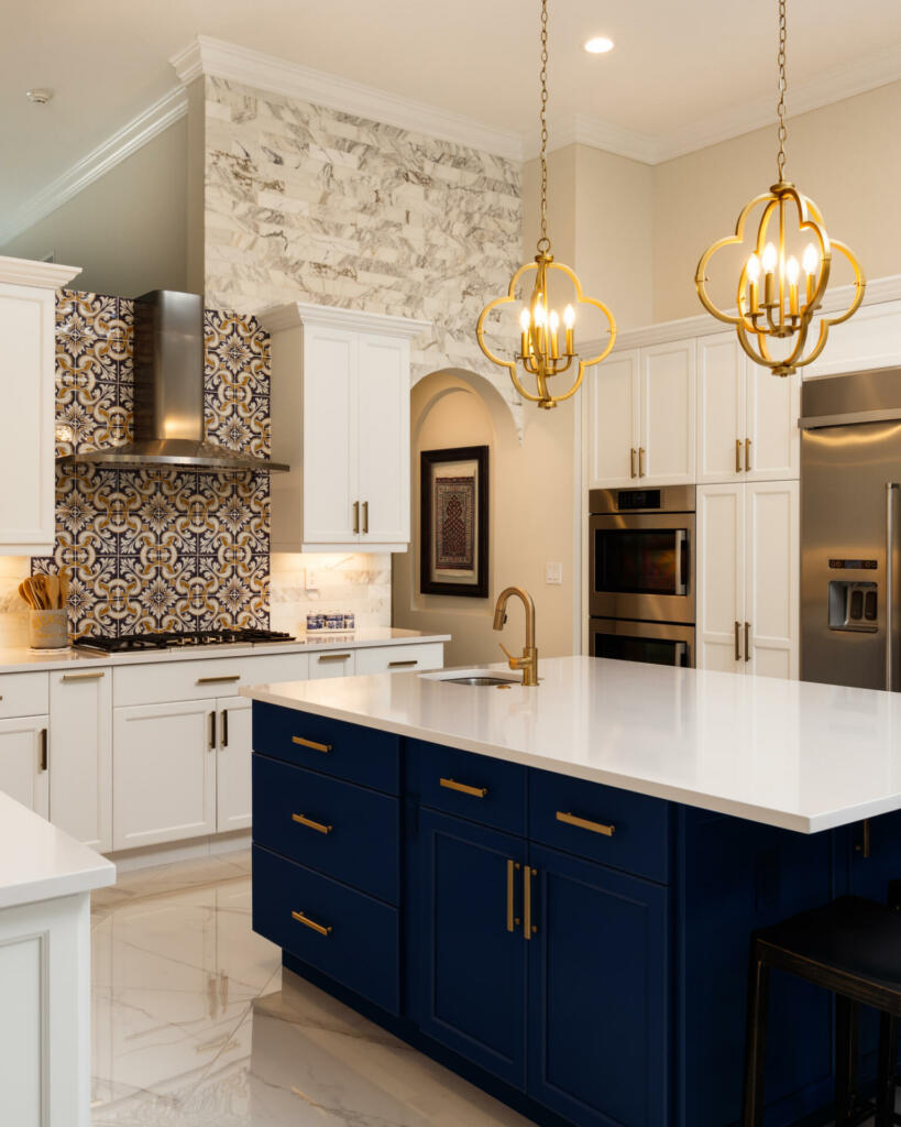 Beautiful luxury estate home kitchen with white cabinets.