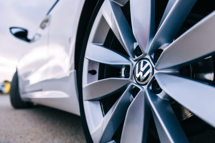 Lisbon, Portugal - January 27, 2019 A close-up of a titanium disk. white car Volkswagen. close up