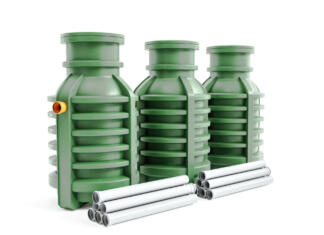 Katero čistilno napravo izbrati? 3d rendering of three green household septic tanks on white background