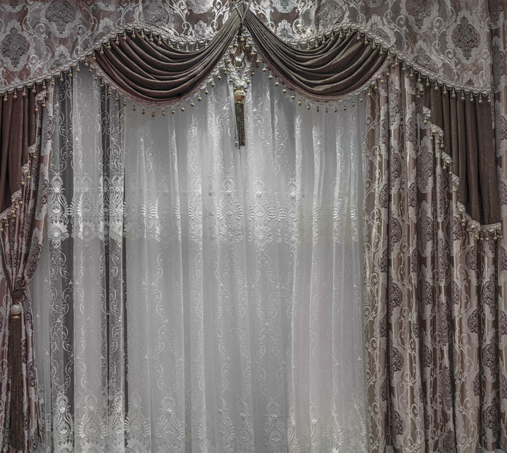 Luxurious design of windows and walls with brown curtains, pelmet and tulle