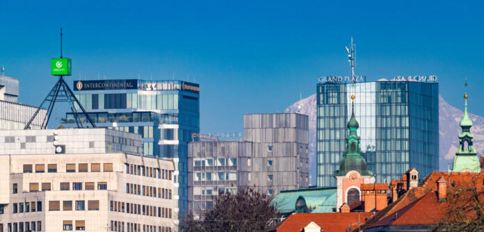 Ljubljana, Slovenia - December 23, 2023: Downtown Ljubljana, the Intercontinental and Grand Plaza hotels, Avtotehna building, SKB bank and Franciscan Church of the Annunciation.