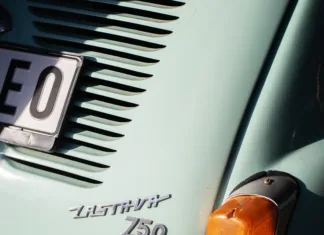 Kako se je včasih peljalo na morje: V noben drug avto ni šlo toliko ljudi in prtljage kot v fička! Light green color Zastava 750 (Fica) 1955-1985 Yugoslavian licensed copy of Fiat 600 (with engine 767 cm³). Back side view - taillights, engine hood and nameplate details. Palic, Serbia, 02.11.2023