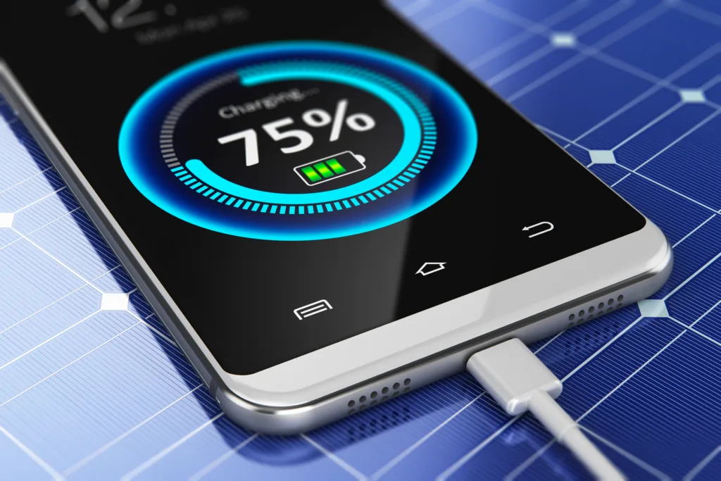 Creative abstract modern wireless technology business concept: 3D render illustration of the macro view of smartphone or mobile phone charging with a portable solar power battery panel with selective focus effect