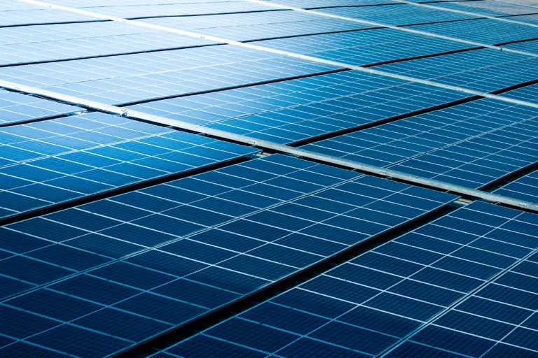 Close-up of Solar cell farm power plant eco technology.concept of sustainable resources and renewable energy.blue tone.