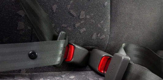 car three-point safety belt, buttoned, the concept of road safety, life and health of the driver and passengers, compliance with traffic rules