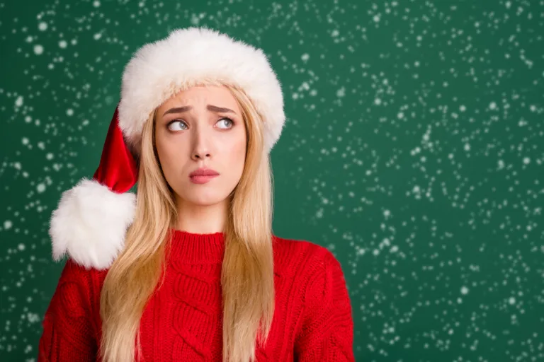 Photo of unhappy young upset doubtful woman look empty space christmas season isolated on green color background