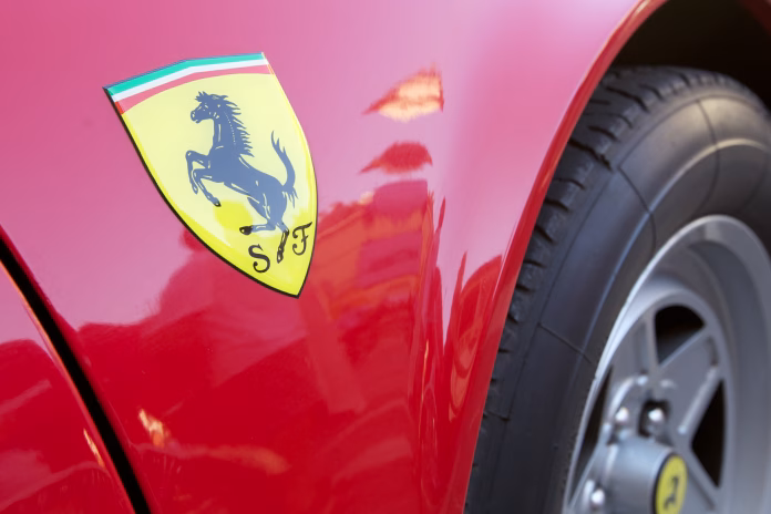 faenza-italy-august-21-2011-close-up-to-the-famous-ferrari-logo-on-flaming-red-ferrari-360-modena-parked-in-a-faenza-square-in-italy-the-year-production-for-this-car-is-from-1999-to-2004-ferrari-is-an-stockpack-istock Faenza, Italy - August 21, 2011: Close up to the famous Ferrari logo on flaming red Ferrari 360 Modena parked in a Faenza square in Italy. The year production for this car is from 1999 to 2004. Ferrari is an italian luxury sports car manufacturer based in Maranello, Modena.
