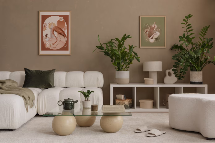 warm-and-cozy-autumn-beige-composition-of-living-room-interior-with-green-plants-mock-up-poster-frame-art-boucle-sofa-stylish-coffee-table-patterned-rug-marble-lamp-and-personal-accessories-home-decor-stockpack-istock Warm and cozy, autumn beige composition of living room interior with green plants, mock up poster frame, art, boucle sofa, stylish coffee table, patterned rug, marble lamp and personal accessories. Home decor. Template.
