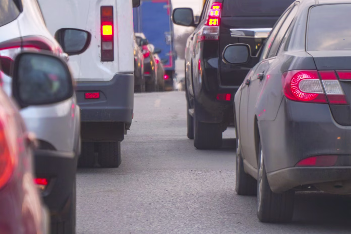 Cars standing in a traffic jam on a city street