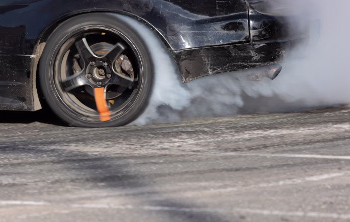 Smoke on wheel and Speed of drift race car.