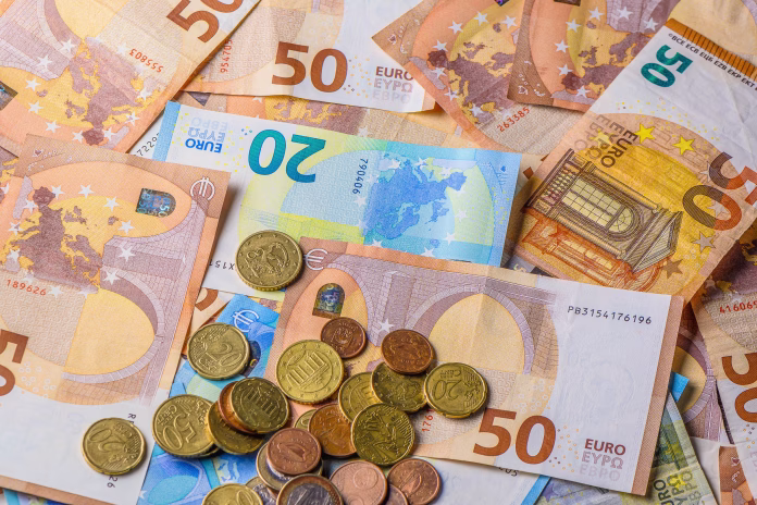 Euro banknotes on the table. Close up of euro cash money background, concept of finance and good earnings