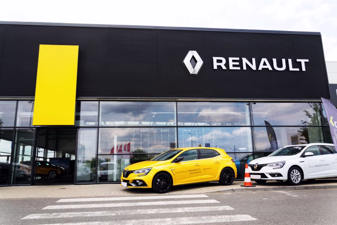 Prague, Czech Republic - August 15, 2018: Renault company logo on car in front of dealership building on August 15, 2018 in Prague, Czech Republic.
