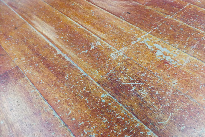corroded-and-damaged-seasoned-wooden-floor-plank-with-scratch-marks-needs-restoration-stockpack-istock Corroded and damaged seasoned wooden floor plank with scratch marks needs restoration