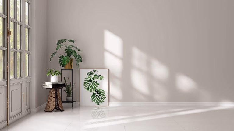 Empty room with light beige wall, monstera plant, poster frame and green tropical plant in sunlight from glass door on white floor for interior design decoration, lifestyle product background 3D