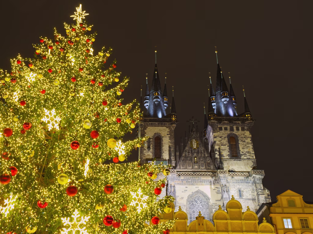 Christmas tree in front of Church of Our Lady before Týn in old town square of Prague, Czech Republic