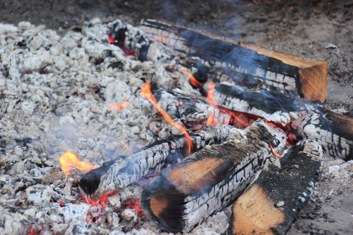 The burned-down campfire