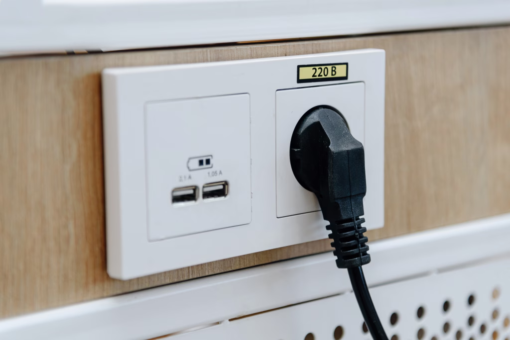 white socket with plug plugged in, electricity, electric energy