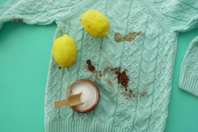 Lemon and baking soda on a Stained Sweater. Eco Friendly Cleaning.