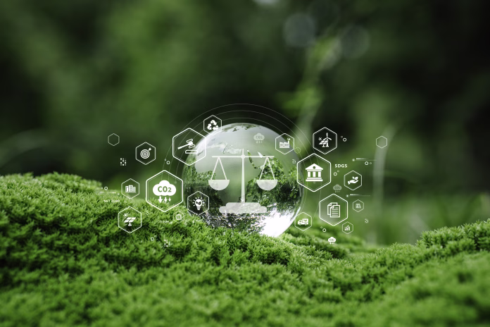 Sustainability environmental law, CO2 reduction. Glass globe on green moss with eco-law icons symbolizing green legal framework and nature protection.