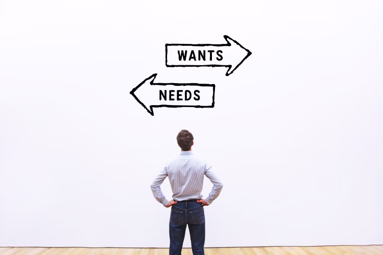 Wants vs needs choice concept, difference between what you want and what you really need