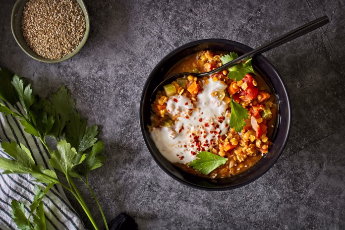 Vegan red lentil dahl with greens