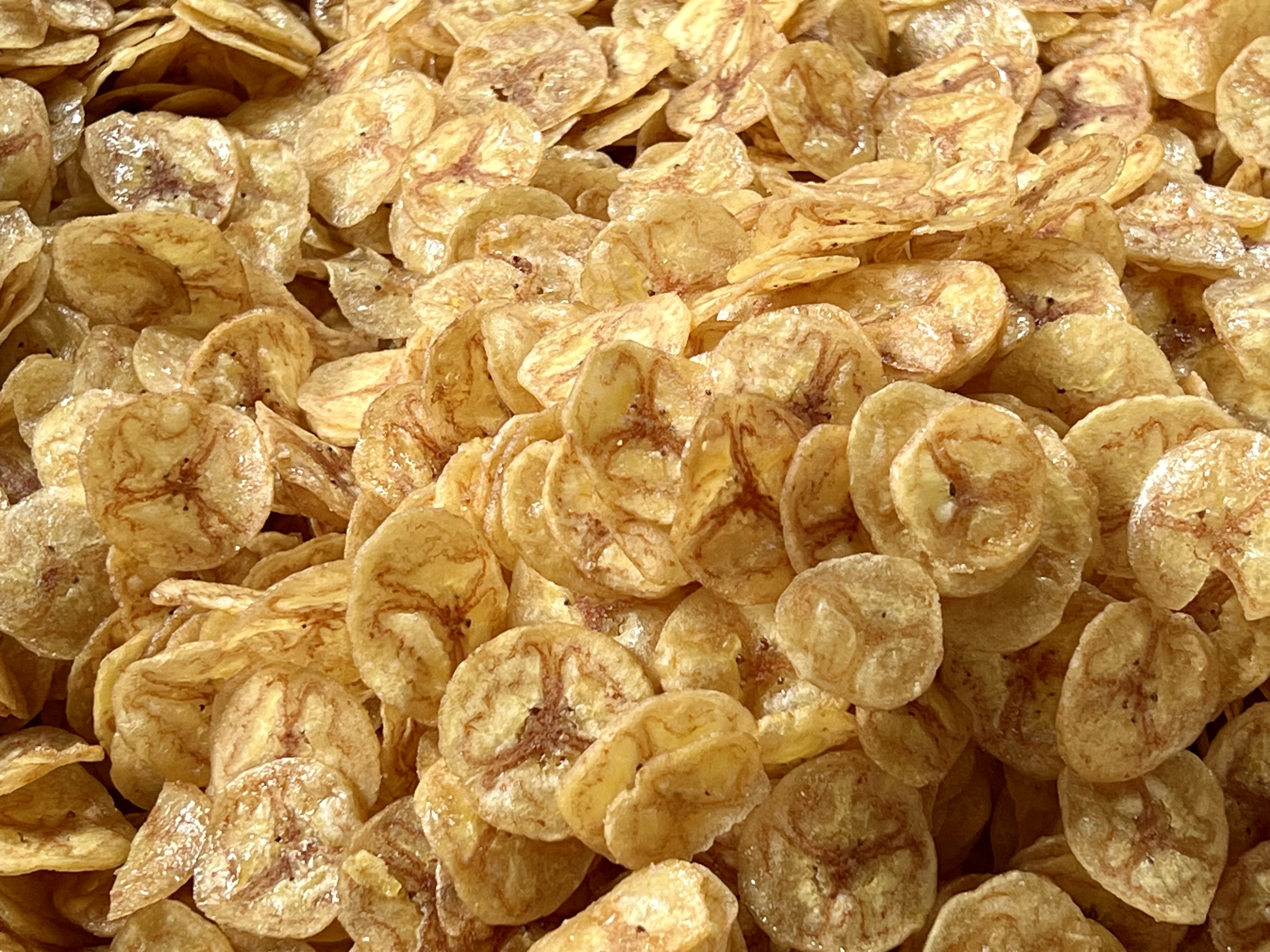 Banana chip or banana crisp is a snack from fried bananas or dried bananas cut into thin, crispy slices. Made from Kluai Khai bananas coated with sugar.
