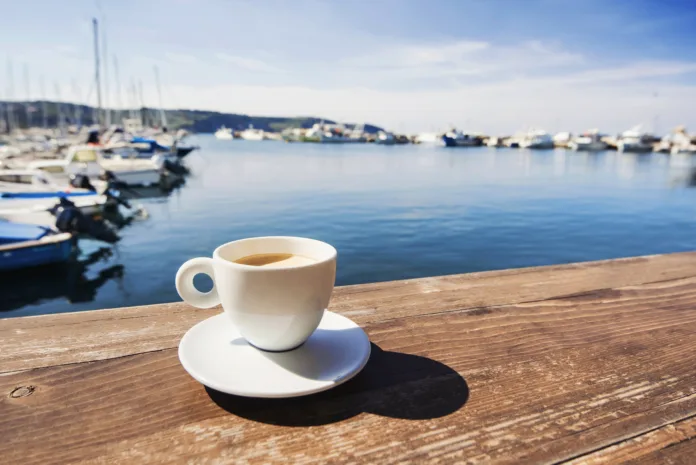 coffee-cup-on-a-table-in-a-mediterranean-cafe-stockpack-istock Coffee cup on a table in a mediterranean cafe