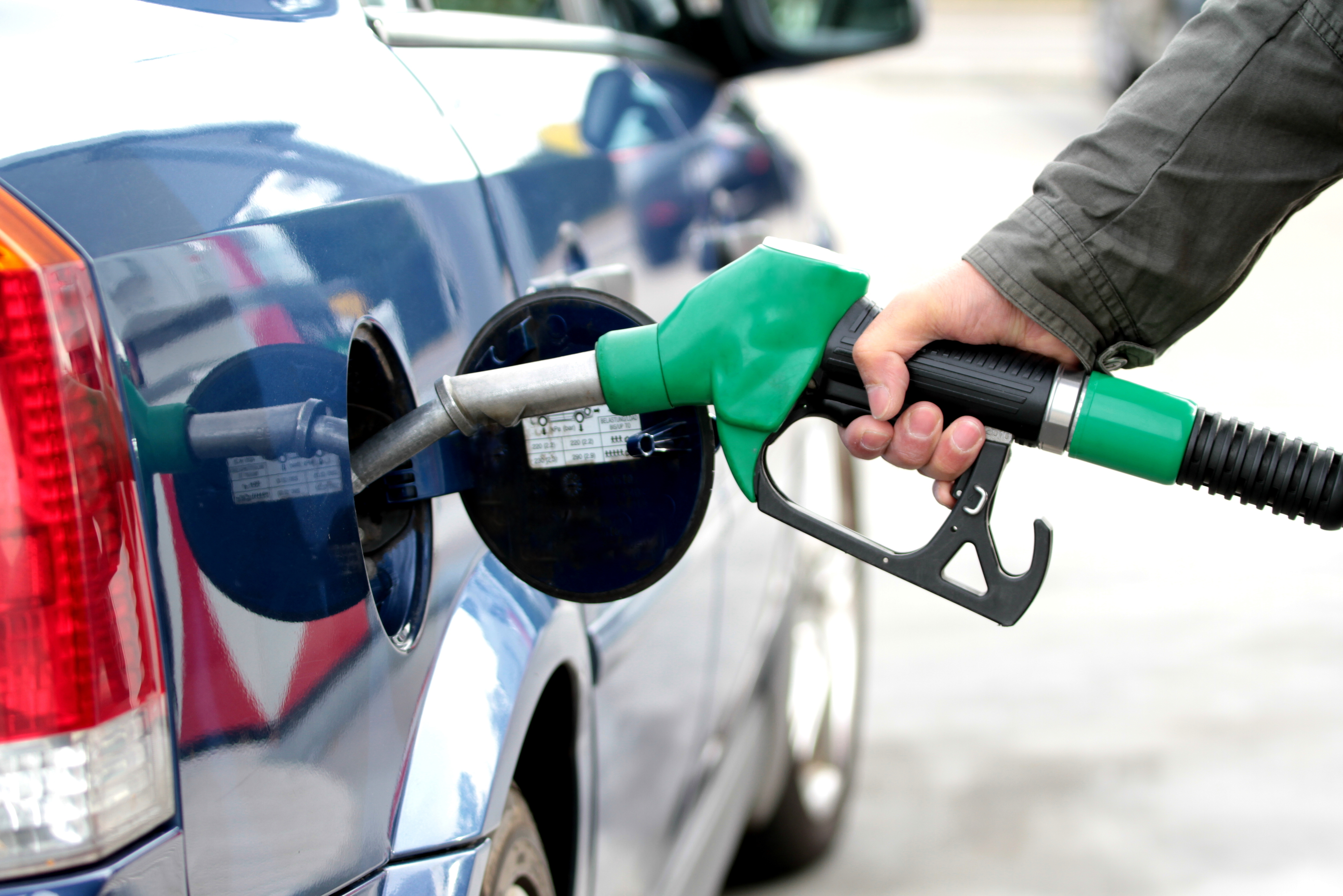 pumping-fuel-in-to-the-tank-close-up-image-stockpack-istock Pumping fuel in to the tank close up image