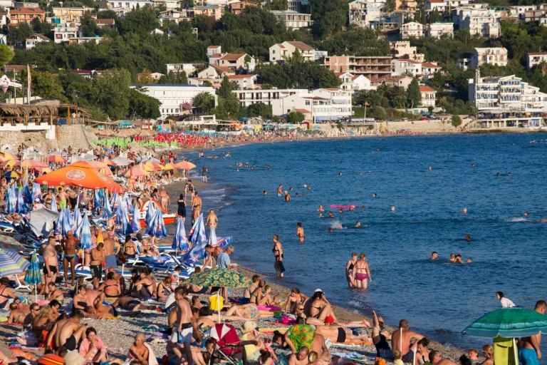 SUTOMORE, MONTENEGRO - SEPTEMBER 07, 2015:  Unidentified people are relaxing on the beach. Montenegro is one of the most attractive destinations for tourists