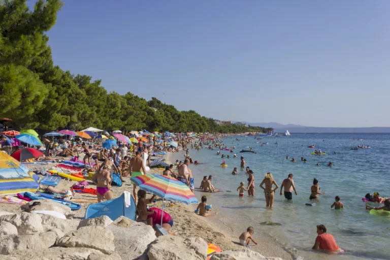 BASKA VODA - CROATIA - AUGUST 15 2017: Crowd of people od Vaska Boda beach in summer season